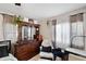 Bedroom featuring a dresser, chair, and large windows at 2606 S Wilder Loop, Plant City, FL 33565