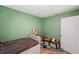 Small bedroom with a twin bed and toy storage at 2606 S Wilder Loop, Plant City, FL 33565