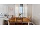 Cozy dining area with a wooden table and chairs near the kitchen at 2606 S Wilder Loop, Plant City, FL 33565