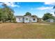 Cute house with green door and landscaping at 2606 S Wilder Loop, Plant City, FL 33565