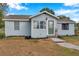 Newly painted house with green door and landscaping at 2606 S Wilder Loop, Plant City, FL 33565