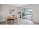 Kitchen dining area with table and access to backyard at 2812 Gumbo Limbo Dr, Wimauma, FL 33598