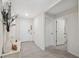 Bright foyer with tile floors and neutral tones at 2812 Gumbo Limbo Dr, Wimauma, FL 33598