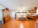 Dining room with hardwood floors and built-in hutch at 3020 Moss Hill St, Wesley Chapel, FL 33543