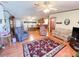 Living room with hardwood floors and seating area at 3020 Moss Hill St, Wesley Chapel, FL 33543