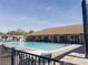 Another view of the community pool with lounge chairs at 3020 Moss Hill St, Wesley Chapel, FL 33543