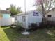 Exterior view of back yard shed on a grass lot at 3060 64Th N Ave, St Petersburg, FL 33702