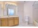 Bathroom with double vanity and tiled floors at 30817 Prout Ct, Wesley Chapel, FL 33543