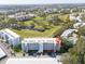 Aerial view of condo building near golf course at 3780 Pinebrook Cir # 106, Bradenton, FL 34209