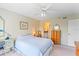 Comfortable bedroom with a queen-size bed and ensuite bathroom at 3780 Pinebrook Cir # 106, Bradenton, FL 34209