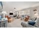 Cozy living room with plenty of seating and a neutral color scheme at 3992 60Th N St, St Petersburg, FL 33709