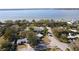 Aerial view showcasing a waterfront home and neighborhood at 400 Country Club Dr, Oldsmar, FL 34677