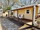 Outdoor storage with covered patio and seating at 400 Country Club Dr, Oldsmar, FL 34677