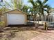 Detached garage with a covered patio at 400 Country Club Dr, Oldsmar, FL 34677