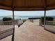 View from inside a waterfront gazebo with access ramp at 400 Country Club Dr, Oldsmar, FL 34677