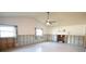 Living room under renovation, showing exposed framing and flooring at 400 Country Club Dr, Oldsmar, FL 34677