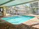 Refreshing screened pool, perfect for relaxation at 400 Country Club Dr, Oldsmar, FL 34677