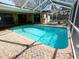 Inviting screened pool with brick pavers at 400 Country Club Dr, Oldsmar, FL 34677