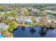 Aerial view of home and waterfront property at 404 Manor Blvd, Palm Harbor, FL 34683