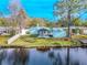 Aerial view of home on waterfront property at 404 Manor Blvd, Palm Harbor, FL 34683