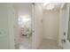 Clean bathroom with shower, toilet, vanity, and tile floors at 404 Manor Blvd, Palm Harbor, FL 34683