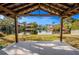 Covered patio overlooking a tranquil canal at 404 Manor Blvd, Palm Harbor, FL 34683