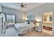 Spacious bedroom with king-size bed and en-suite bathroom access at 4415 Muirfield, Bradenton, FL 34210