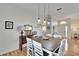 Dining area with hardwood floors and a charming table setting at 4415 Muirfield, Bradenton, FL 34210