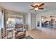 Relaxing living room with recliner and view into kitchen at 4415 Muirfield, Bradenton, FL 34210