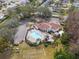 Aerial view showing pool, clubhouse, and grounds at 4529 Whitton Way # 211, New Port Richey, FL 34653