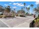 Gated community entrance with landscaping at 4529 Whitton Way # 211, New Port Richey, FL 34653