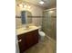 Clean bathroom with shower, toilet and vanity at 4814 Northdale Blvd, Tampa, FL 33624