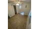 Bedroom with tile floors, ceiling fan, and spacious closet at 4814 Northdale Blvd, Tampa, FL 33624