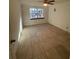 Large bedroom with tile floors and ample natural light at 4814 Northdale Blvd, Tampa, FL 33624