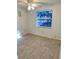 Bright bedroom with tile floors and ceiling fan at 4814 Northdale Blvd, Tampa, FL 33624