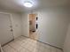 Neat laundry area with access to kitchen at 4814 Northdale Blvd, Tampa, FL 33624