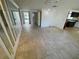 Living room with tile floors and mirrored wall at 4814 Northdale Blvd, Tampa, FL 33624