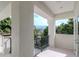 Bright and airy balcony with water views and lush greenery at 4818 W San Rafael St, Tampa, FL 33629