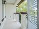 Private balcony with wood-look tile flooring at 4818 W San Rafael St, Tampa, FL 33629