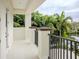 Private balcony offering serene water views and lush foliage at 4818 W San Rafael St, Tampa, FL 33629