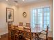 Formal dining room with wood table and chairs at 4818 W San Rafael St, Tampa, FL 33629