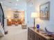 View of the living room from the entryway with tiled floors and elegant decor at 4818 W San Rafael St, Tampa, FL 33629