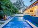 Luxury pool with spa and lounge chairs; perfect for relaxation at 4818 W San Rafael St, Tampa, FL 33629