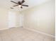 Spacious bedroom with tile floors and ceiling fan at 4918 Cresthill Dr, Tampa, FL 33615