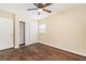 Well-lit bedroom, featuring wood-look floors and a large closet at 4918 Cresthill Dr, Tampa, FL 33615