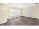 Bright living room featuring dark hardwood floors at 4918 Cresthill Dr, Tampa, FL 33615