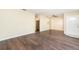 Bright living room featuring dark hardwood floors at 4918 Cresthill Dr, Tampa, FL 33615