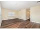 Bright living room featuring dark hardwood floors at 4918 Cresthill Dr, Tampa, FL 33615