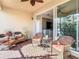 Screened patio with sliding doors leading to the interior at 4935 Marble Springs Cir, Wimauma, FL 33598