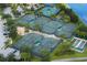 Aerial view of community tennis courts at 4935 Marble Springs Cir, Wimauma, FL 33598